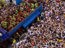 La tomatina de Buñol, una tradición que inició con un altercado resuelto de forma más o menos civilizada. AFP /