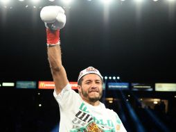 Johnny venció el fin de semana a Abner Mares y le arrebató su título. AP /