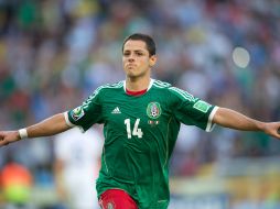 El diario menciona que Hernández no está entre los delanteros consentidos del técnico de los Red Devils, David Moyes. MEXSPORT /