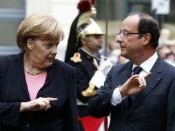 La Canciller alemana y el Presidente francés están de acuerdo con un castigo severo al régimen de violencia que viven en Damasco. ARCHIVO /