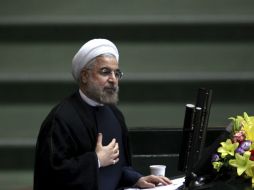 El madatario iraní, Hasán Ruhani manifiesta expresamente su apoyo a su homólogo de Siria, Bashar Assad. AP /