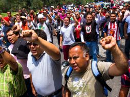 Los ciudadanos exigen la salida de los manifestantes de la CNTE con diversos mensajes. NTX /