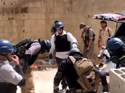 Expertos de la ONU en armas químicas recogieron muestras de la zona del ataque para definir si se utilizo alguna sustancia ilegal. EFE /