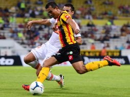 Acción del duelo entre los Leones Negros y Correcaminos. MEXSPORT /