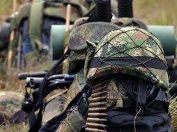 En Colombia persisten los ataques entre las FARC y los militares, a pesar de los diálogos de paz que sostienen ambos bandos. ARCHIVO /