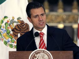 Según lo publicado en la página web, lo que caracteriza a la administración es la firma del Pacto por México. AP /
