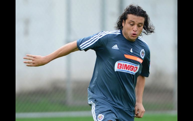 Reynoso abandona el duelo ante los 'Diablos Rojos' al minuto 83. MEXSPORT /