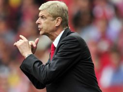 Arsene Wenger está feliz con la llegada de Mesut Özil al equipo. ARCHIVO /