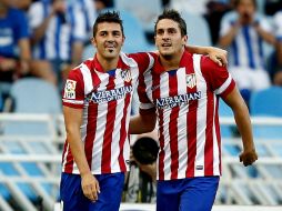 El 'Guaje' Villa (i) salió del club catalán por apenas 2.1 millones de euros. EFE /