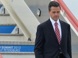 Peña Nieto, a su llegada a San Petesburgo, Rusia. AFP /