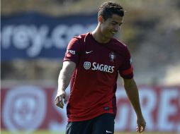 Los compañeros de Cristiano Ronaldo esperan que se recupere. AFP /