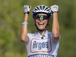 El ciclista del equipo argos se adjudica el décimo tercer recorrido. AP /