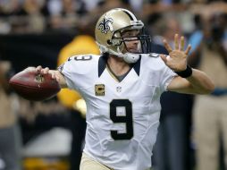 Drew Brees sigue confirmando su estatus de pasador de élite al lanzar para 357 yardas en la victoria de los Santos. AP /
