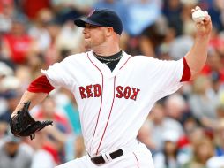 Jon Lester obtiene su victoria 14 de la temporada, tras dominar a los Yankees. AFP /