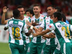 Jugadores de León celebran la victoria. MEXSPORT /