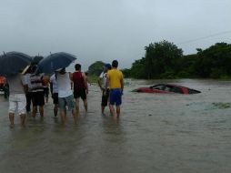 En algunos municipios se han reportado inundaciones a causa del paso de la tormenta. EFE /