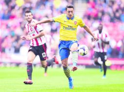 Mesut Özil fue la contratación más cara del futbol inglés; Arsenal pagó por él 50 MDE al Real Madrid. AFP /