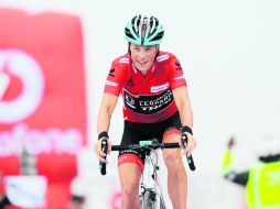 Hora de sonreír. Chris Horner cruza la línea de meta de la etapa 20 en el segundo lugar. AP /