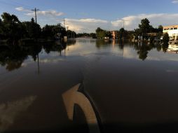 Hasta ahora se ha registrado la muerte de siete personas por las inundaciones. AP /