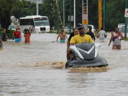 Tormentas ''Manuel'' e ''Ingrid'' dejan al menos 40 muertos en el país. Autoridades reportan al menos 230 mil damnificados. EFE /