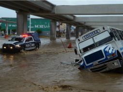Las calles en esa región han quedado destruídas por los efectos de ''Manuel''. EFE /