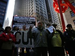 Activistas de ''Ocupa Wall Street'' vuelven a la plaza Zuccotti, en el corazón del centro financiero de Nueva York. AFP /