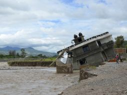 El meteoro ha afectado principalmente el estado de Guerrero donde se registran severas inundaciones y deslaves. AP /