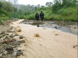 La SCT señala que dependerá de que las lluvias permitan concluir los trabajos de retiro de materiales. ESPECIAL /