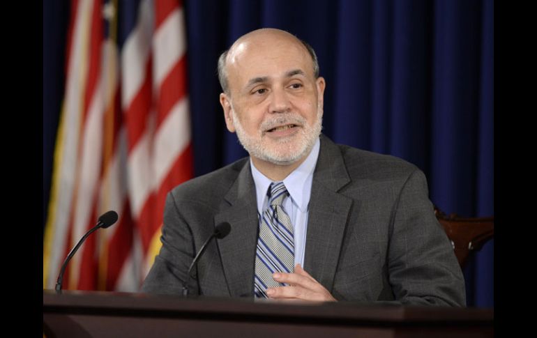 El presidente de la Reserva Federal, Ben Bernanke, y otros ocho miembros del comité votaron a favor de seguir con los estímulos. AP /