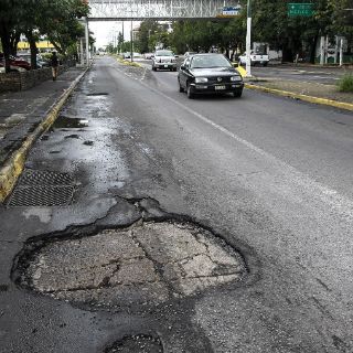 ''Manuel'' genera ocho hectáreas de baches en Guadalajara