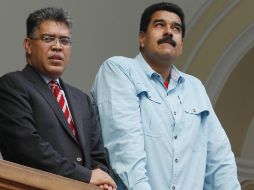 Nicolás Maduro (d) tiene planeado un viaje a China junto al canciller Elías Jaua (i). AP /