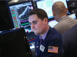 Las pérdidas en Wall Street de esta jornada fueron marcadas por las discusiones que el Senado de EU mantiene en torno al presupuesto. ARCHIVO /