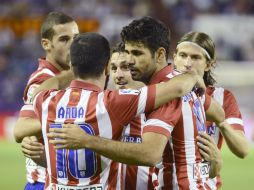 El Atlético al igual que el Barcelona ha ganado todos sus encuentros de liga, lo que los hace compartir el liderato. EFE /