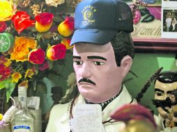 La figura de Jesús Malverde, el santo de los narcotraficantes, es un infaltable en el Museo de Enervantes. AFP /