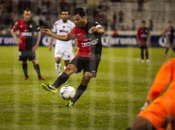 Omar Bravo se hizo presente en el marcador y en el tercer gol del Atlas.  /