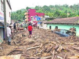 Las poblaciones afectadas por los deslaves todavía están haciendo recuento de daños. NTX /
