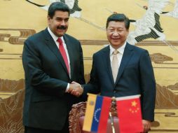 El presidente venezolano, Nicolás Maduro (i), y su homólogo chino, Xi Jinping. EFE /