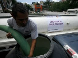 Los habitantes han sufrido desabastecimiento de agua. AFP /