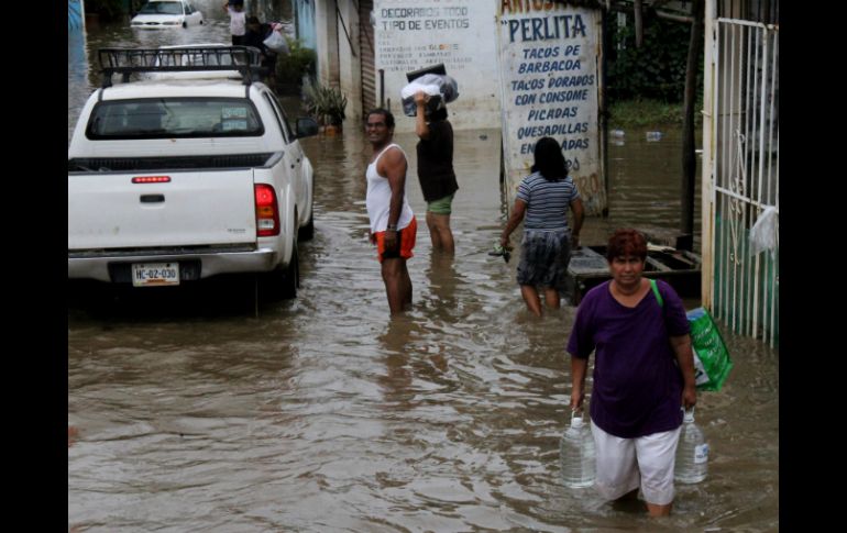 La empresa de comunicación móvil ayuda al estado más afectado por las pasadas tormentas tropicales. EFE /