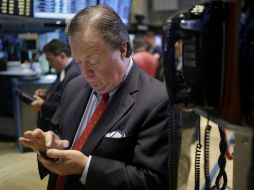 En Wall Street siguen a la expectativa de lo que pueda ocurrir con la discusión presupuestaria en EU. ARCHIVO /