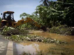 ''Manuel'' sólo pasó como tormenta tropical y aún así provocó daño a infraestructura, viviendas y cosechas. ARCHIVO /