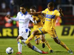 Los Tigres lograron aprovechar tener un hombre de más para sacar el empate de la cancha de La Corregidora. MEXSPORT /