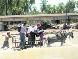 Guerrero. En el municipio de Coyuca de Benítez el nivel del agua no ha disminuido. AFP /