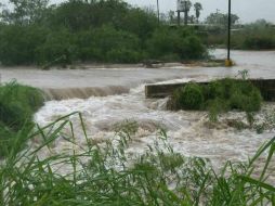 El paso del huracán ''Ingrid'' dañó a varias carreteras en Tamaulipas. Tomada de @Clima_Tamps. ESPECIAL /