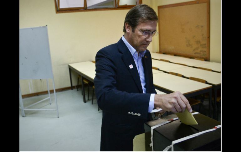 El primer ministro portugués Pedro Passos Coelho vota en las elecciones locales. AFP /