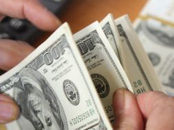 El dólar se debilita ante las principales divisas del mundo por la incertidumbre por el tema del presupuesto y techo de deuda en EU. ARCHIVO /