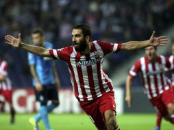 Arda Turan celebra la anotación del triunfo del Atlético de Madrid, que sigue en plan grande. EFE /