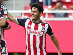 El atacante de los Rojiblancos cree que pueden sacar el resultado ante el acérrimo rival. EFE /