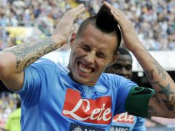 Marek Hamsik celebra uno de sus tantos durante el juego. AP /