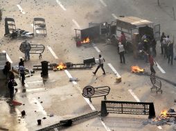 Heridos por balas y con contusiones, alrededor de 80 civiles resultan con lesiones por los enfrentamientos con la policía. AFP /